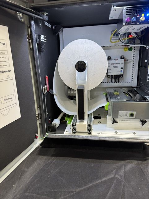 Pole-mounted enclosure and wireless antenna
