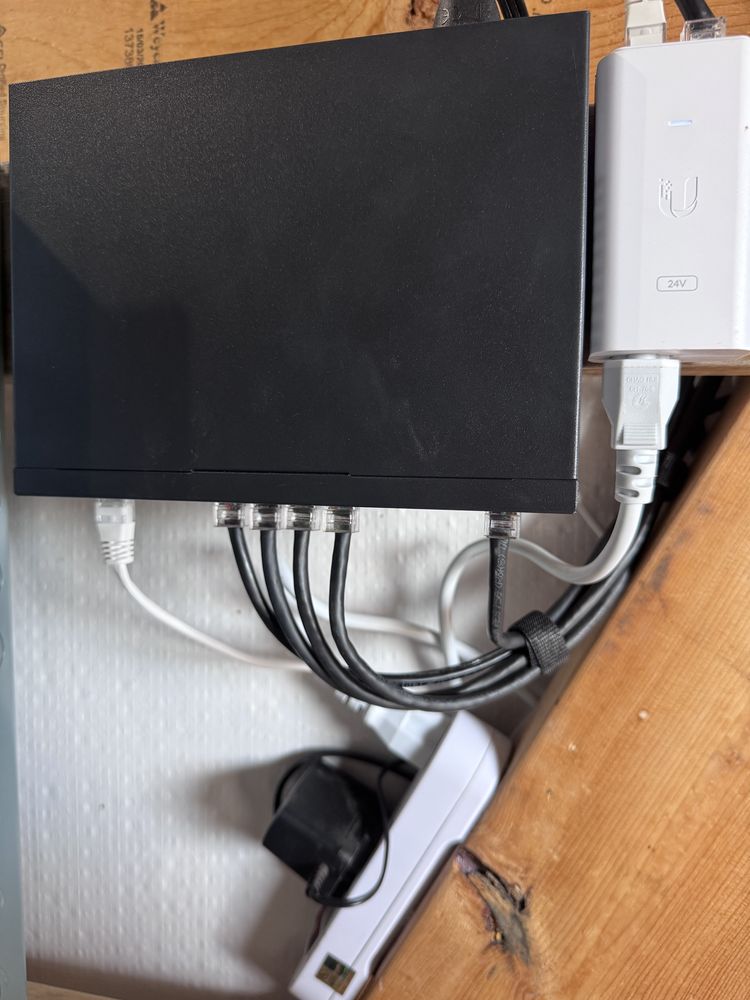 Pole-mounted camera and enclosure with wireless backhaul
